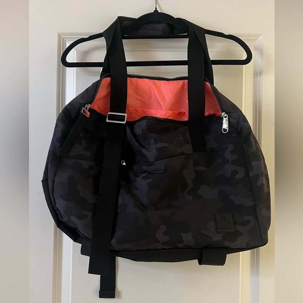 Reebok Black Camouflage Travel Gym Duffel Bag with Vibrant Orange Lining